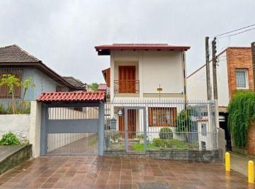 .jpg+2025-03-04 · Casa em Porto Alegre, no bairro Tristeza, com 3 dormitório(s), e 3 banheiros, à