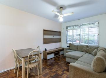 Apartamento en Venda de 3 quartos Menino Deus · Apartamento térreo com pátio privativo no coração do Menino Deus, 2 dormitórios.
