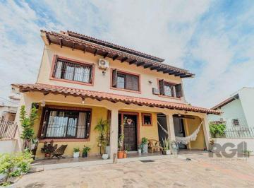 Casa · 237m² · 3 Quartos · 3 Vagas · Casa com 234m², 3 dormitórios, 3 vagas no bairro Partenon