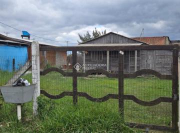 Terreno · 24m² · Terreno Urbano em Capão Novo com uma Casa de Madeira