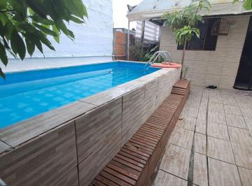 tymg0jk2owrhnty5zgjmn2u3_md · Casa à venda no Melvi, em Praia Grande SP.
