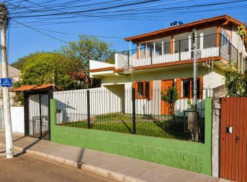 4aa01a06804a3989f63151108fcc06493c15c071 · Casa com 4 dormitórios para alugar, 205 m² na Cavalhada por R$ 3.334/mês - Cavalhada - Porto Alegre/