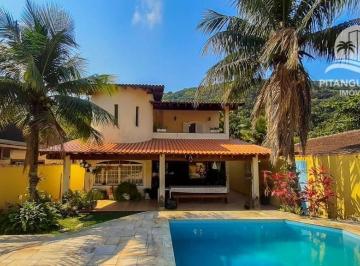 21e6da9f70df3cdcec7fca650ab1399942623628 · Casa com 4 dormitórios à venda, 359 m² por R$ 1.800.000,00 - Guaiuba - Guarujá/SP