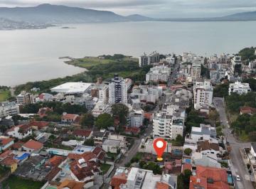 3 · Terreno de 560m² em Coqueiros