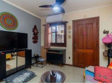 Casa à venda localizado no bairro Camaquã. Area construída de 100m², com 3 dormi · Casa em condomínio 3 dormitórios ´- Bairro Camaquã