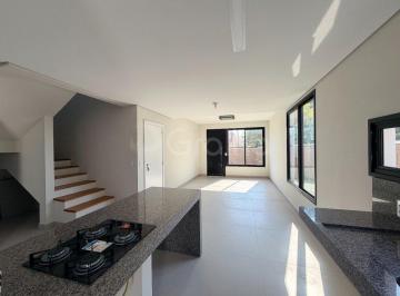 Casa · 138m² · 3 Quartos · 2 Vagas · Casa geminada nova, de ponta , no Carianos de 2 andares, living integrado e 3 dorm com suíte.