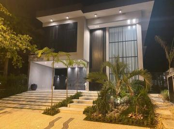 Foto 01 · Belíssima casa alto padrão para venda na praia de Riviera de São Lourenço.
