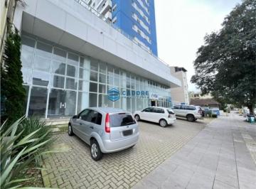 23864834_4.jpg · Prédio moderno com fachada envidraçada.