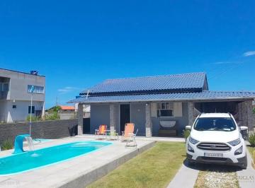 Foto 1 · CASA COM PISCINA A 500 METROS DA PRAIA – JAGUARUNA/SC