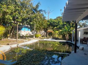 Foto 01 · Chácara à venda em Itanhaém com 1.200m², lago para pesca, piscina e escritura definitiva