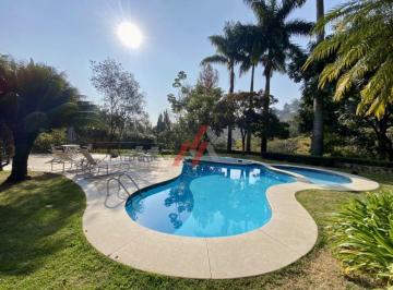 Foto 01 · Linda casa em condomínio no Residencial Tamboré: 4 suítes, 3 salas, 7 banheiros, 10 vagas e 780m² em
