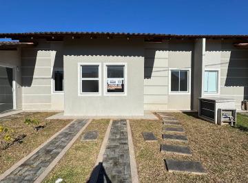 Casa · 50m² · 2 Quartos · 1 Vaga · Casa pronta em condomínio fechado com 2 dormitórios e amplo terreno em Araquari