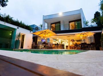 Casa de 6 quartos, Bertioga · esta residência une conforto, espaço e sofisticação em cada detalhe.