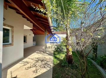 img1 · Casa espaçosa com excelente acabamento e 03 suítes à venda no bairro Cidade Jardim em Caraguatatuba,