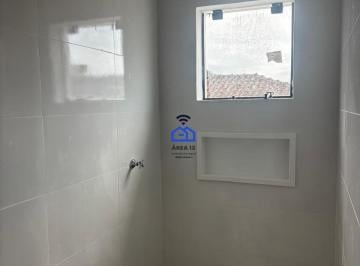 img1 · Sobrado geminado à venda no bairro Massaguaçu em Caraguatatuba, SP com 2 suítes 2 vagas de garagem