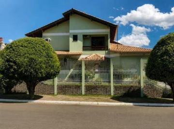Casa · 284m² · 3 Quartos · 4 Vagas · Casa de 3 dormitórios, piscina e 4 vagas de garagem em Canoas.