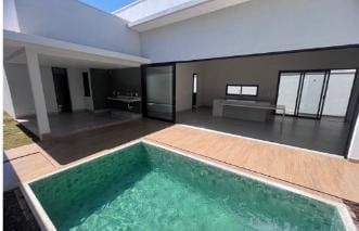 4603bba00f0c49ecaf832672a5a4f69b.jpeg · Casa para Venda em Uberlândia/MG - 3 Dorm. 209 m2 Área Útil