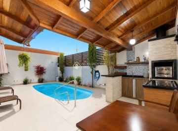 Casa · 316m² · 5 Quartos · 4 Vagas · Ampla Casa com 5 dormitórios, Piscina e Área de Lazer Completa em Capoeiras