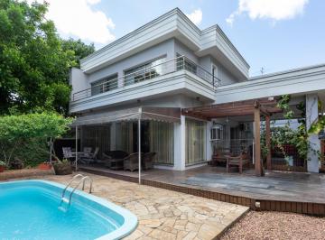 Casa · 400m² · 4 Quartos · 2 Vagas · Sobrado de Alto Padrão com Piscina Aquecida e Espaço Comercial Independente