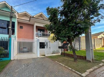 Casa · 128m² · 3 Quartos · 2 Vagas · Sobrado no Centro com Segurança e Conforto para sua Família