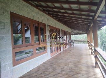 Foto 01 · CASA COM VISTA á VENDA em condomínio fechado em RANCHO QUEIMADO SC