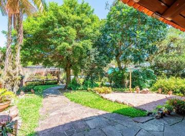 Casa de 4 quartos, Porto Alegre · Casa com amplo terreno e grande área verde à venda no Jardim Isabel
