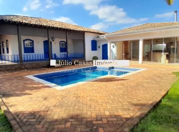 Casa · 1251m² · 3 Quartos · 4 Vagas · Casa Padrão Colonial com 3 Suítes, Cozinha e Área Gourmet Equipadas e Piscina.