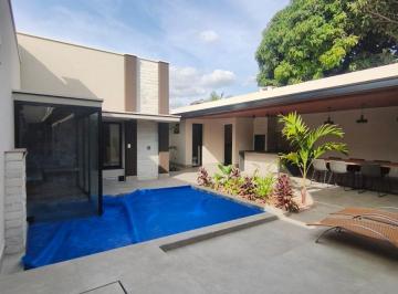 Casa de 3 quartos, Uberlândia · Belíssima casa Alto Padrão à Venda no Cidade Jardim com 3 suítes, piscina em uberlândia