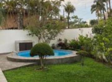 Casa · 332m² · 5 Quartos · 6 Vagas · CASA COM 5 QUARTOS SENDO 3 SUITES
COM PÍSCINA E CHURRASQUEIRA