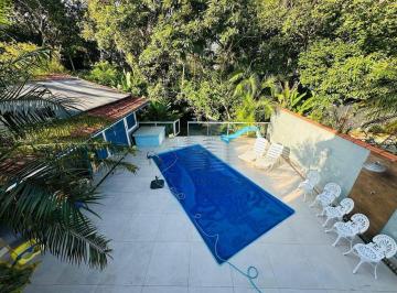 3d5c2c5de967c2db9a3e5ae943e5388daeb31ae7 · Casa com 5 dormitórios à venda, 258 m² por R$ 3.000.000,00 - Riviera - Módulo 26 - Bertioga/SP