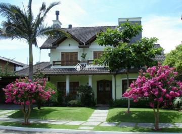 Casa · 320m² · 4 Quartos · 2 Vagas · Auxiliadora Predial aluga belíssima casa em Jurerê Internacional, Florianópolis.