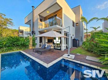 814d5cbf7afd60a096b3742cf1eea80fe4754764 · Village com 4 dormitórios à venda, 205 m² por R$ 3.800.000,00 - Riviera Módulo 24 - Bertioga/SP