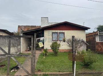 Foto 01 · Casa 2 dormitórios em madeira com amplo pátio na morada do Vale I em Gravatai.