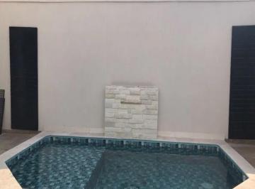 Casa de 3 quartos, Uberlândia · Casa à venda no bairro Jardim Karaiba em Uberlândia com 3 suítes.