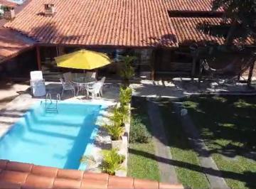 11736269507485.jpeg · Ampla Casa Térrea de Esquina com Piscina e Edícula a Apenas 50 Metros da Praia das Palmeiras em Cara
