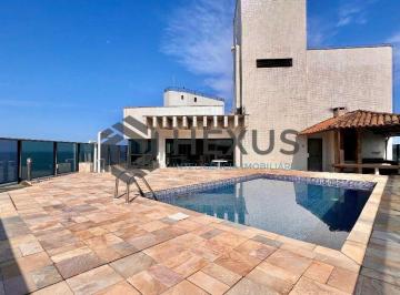 Foto · Cobertura penthouse de alto padrão frente mar com piscina e churrasqueira na Pra