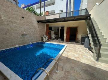 Casa · 126m² · 3 Quartos · 2 Vagas · Casa com 3 dormitórios e piscina à venda, 125 m² por R$ 1.060.000 - Caiçara - Praia Grande/SP