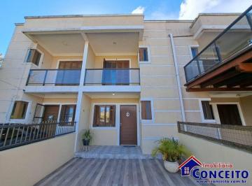 Casa · 100m² · 2 Quartos · DT1002 - Excelente duplex composto de 02 suítes na região Central de Imbé