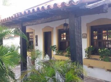 Casa · 600m² · 4 Quartos · 8 Vagas · OPORTUNIDADE ÚNICA: CASA EXUBERANTE NO CENTRO DO PERÓ, CABO FRIO/RJ