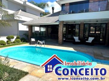 C1028 - Residência de alvenaria, composta de 03 dormitórios, sendo 03 suítes, sa · C1028 - Excelente residência de alto padrão em condomínio no Centro de Imbé