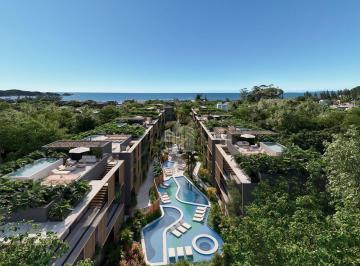 fotomontagem-aerea-com-insercao-do-empreendimento-no-terreno-17822257941742.jpg · Kariió Praia do Estaleiro | Residências de Alto Padrão Integradas à Natureza em Balneário Camboriú