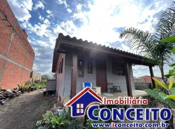 Casa · 63m² · 2 Quartos · 1 Vaga · C640 - Residência de madeira em região de moradores no balneário Nordeste