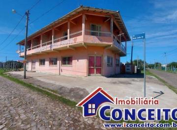 Comercial · 450m² · PC05 -Excelente prédio comercial com 3 apartamentos no balneário Presidente
