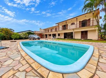 ff971cca1dad729d26ff6cd33380d10689f23cac · Casa com 7 dormitórios à venda, 400 m² por R$ 1.350.000,00 - Cohapar - Guaratuba/PR