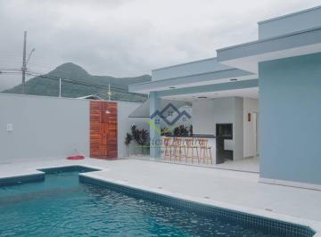 450d5c99bfec5d5edabe15dca03ccf6fbf3ab1a9 · Casa Moderna com Piscina à Venda na Martim de Sá – Caraguatatuba | 3 Quartos | 198 m²
