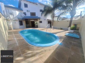Casa · 325m² · 5 Quartos · 2 Vagas · Casa 5 dormitórios, 1 suíte, piscina e 2 vaga de garagem em Canoas.