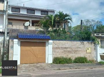 .jpg+2025-03-04 · Casa em Porto Alegre, no bairro Restinga, com 4 dormitório(s), e 4 banheiros, à