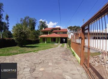 Casa · 350m² · 4 Quartos · 3 Vagas · Casa com 4 dormitorios com 2 suites
