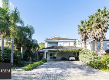 Casa · 458m² · 5 Quartos · 4 Vagas · Casa no Condomínio Las Rocas, vista para o Guaíba, com 5 suítes