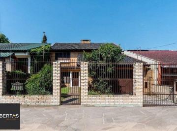 Casa · 230m² · 3 Quartos · 3 Vagas · Residência no bairro Camaquã, com 3 dormitório(s), e 3 banheiros,